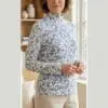 Printed floral turtleneck top for mature women in blue-white and sage